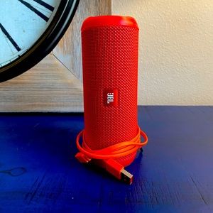 JBL Portal Bluetooth Speaker (RED). Nice sound - w/carrying strap and charger.